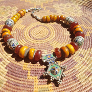 A Little Morocco, Necklace with Amber Beads and Vintage Enamel Pendant Flatlay