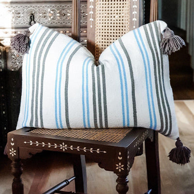 A LITTLE MOROCCO Pompom Cushion Blue and Brown Stripe Front